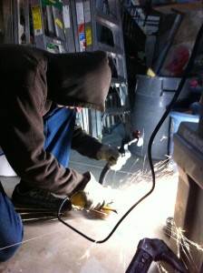 Filing picks down for dry-tooling in the Boulder Rock Club: Ice Climbing Prep 2010.