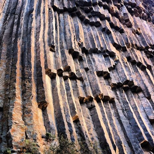 [My first of, hopefully, many new routes in Armenia goes through the three roofs on the left. We called it Viper Bait (12b) named in honor of Majka not getting bitten by the small but deadly snake that was on her route just before I tried this one. Yikes! Photo: Kate Rutherford (@katerutherford)]