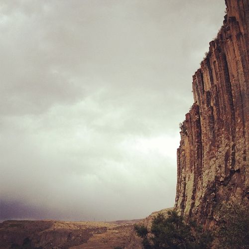 [Storm coming, mid-column climbing day. Wonder if it will flush the snake out of the crack I just backed off of or just make it angrier for tomorrow? Photo- Majka Burhardt (@majkaburhardt)]